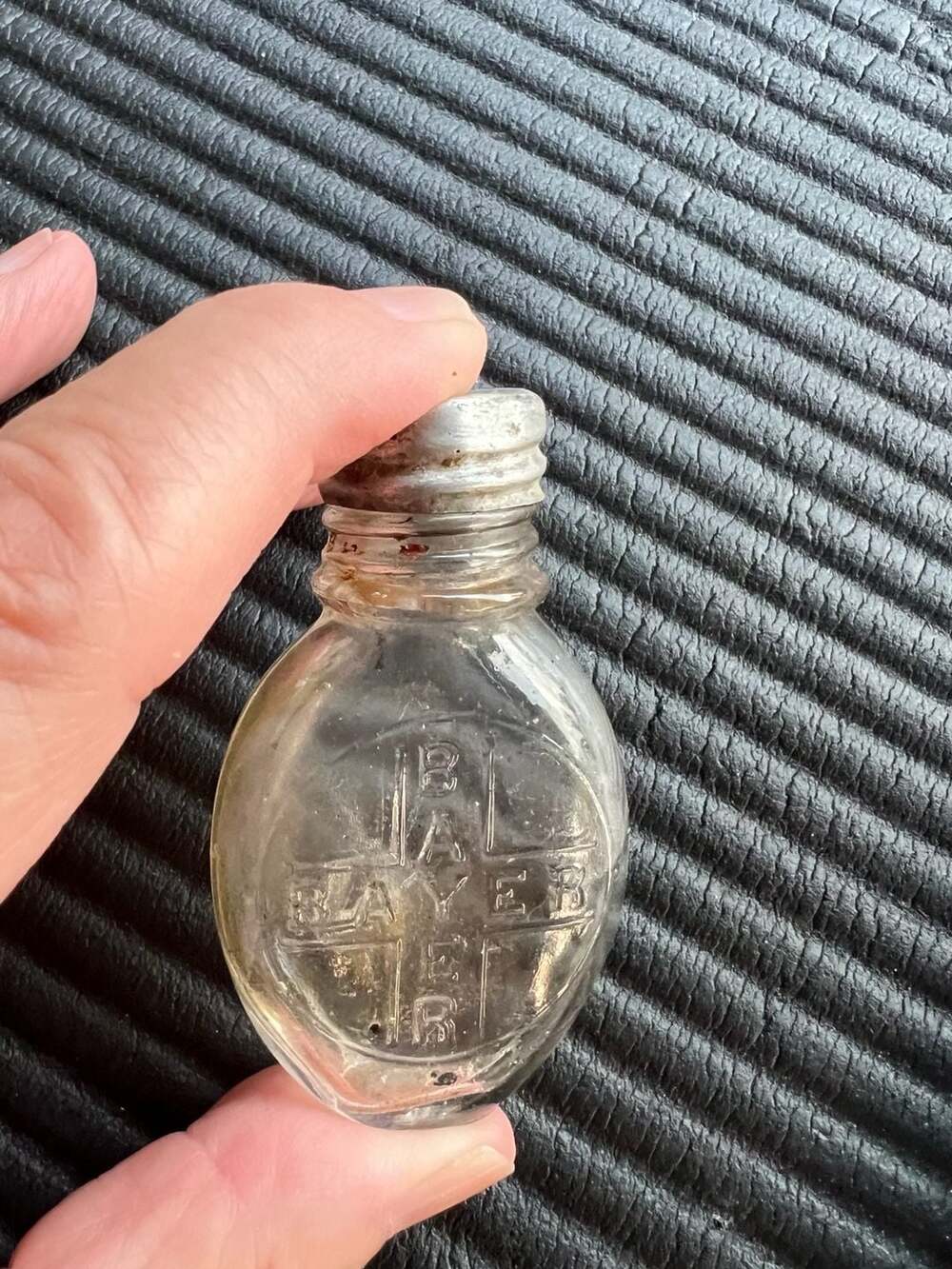 Vintage Bayer Aspirin Glass Bottle with Embossed Cross Design and Metal Cap